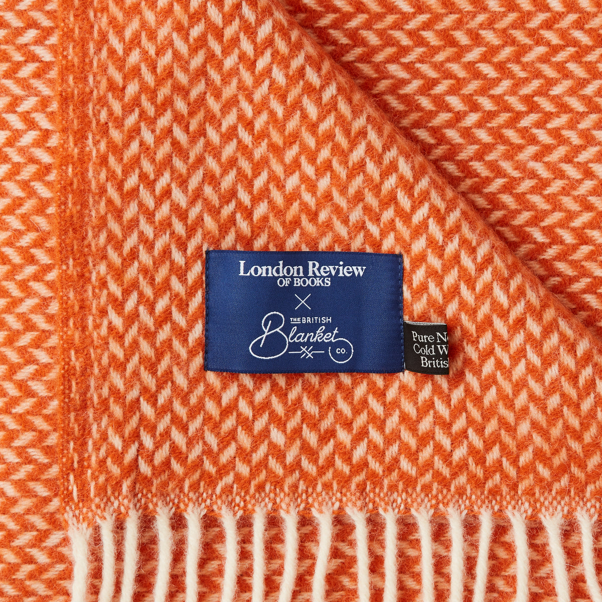Pumpkin Orange Herringbone Blanket with the British Blanket Company